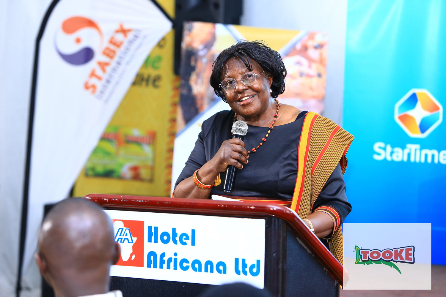 Rev. Prof Florence Mulanga. Executive director for Banana Industrial Research and Development center (BIRDC) presenting a speech at the East Africa Brand Quality Awards gala Rev. Prof Florence Mulanga. Executive director for Banana Industrial Research and Development center (BIRDC) presenting a speech at the East Africa Brand Quality Awards gala