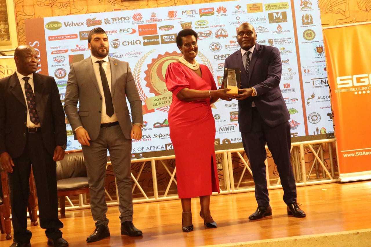 Hon. Amelia Kyambadde together with Amb. Mohammad and Dr. Emeka Akaezuwa presenting an accolade to Stabex International Head of Marketing Mr. Gilbert Otim Hon. Amelia Kyambadde together with Amb. Mohammad and Dr. Emeka Akaezuwa presenting an accolade to Stabex International Head of Marketing Mr. Gilbert Otim