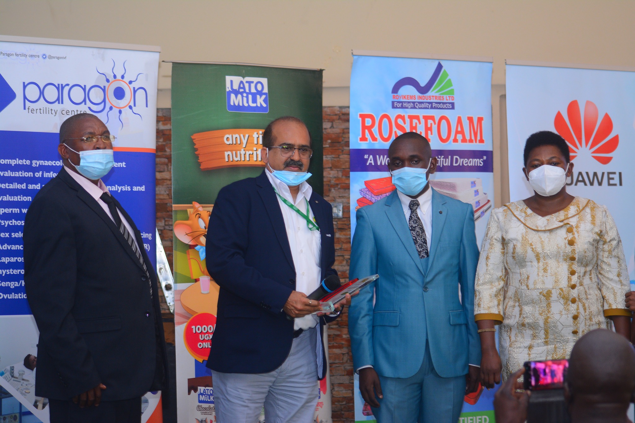 Managing Director Bidco Uganda Ltd recieving the East Africa Brand Quality Awards 2021