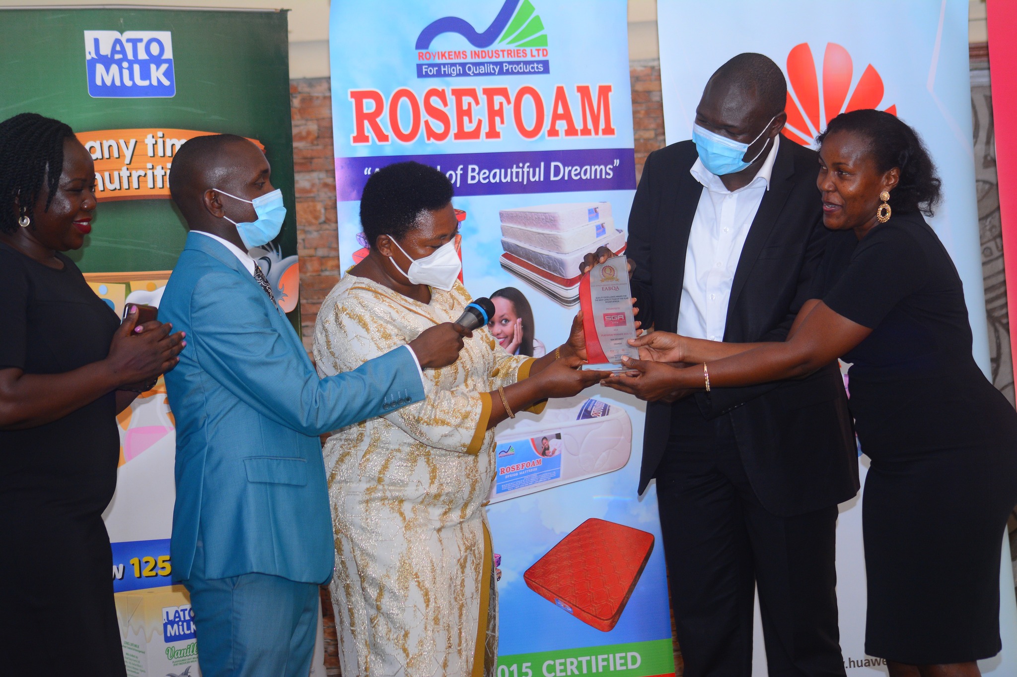 SGA Security represented by Reginah awarded during the East Africa Brand Quality Awards 2021